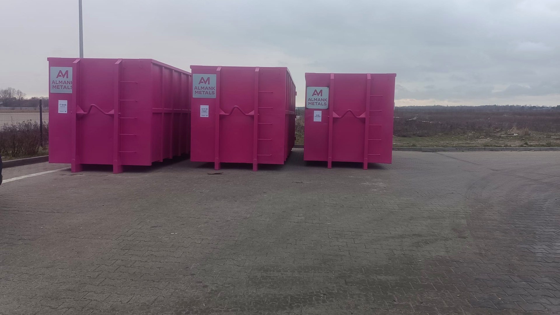ALMANK METALS branded collection containers – industrial yard